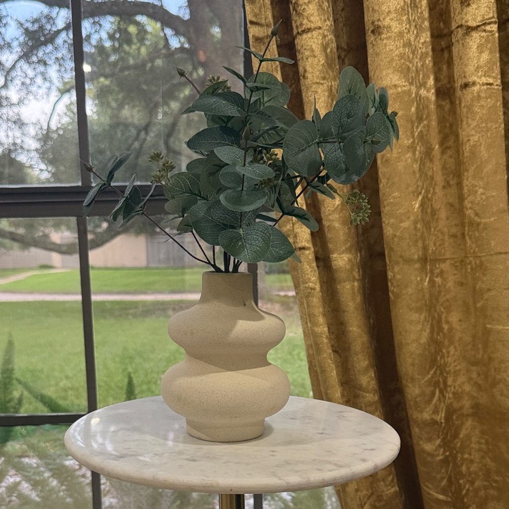 Elegant Cream Vase with Greenery